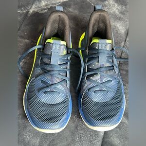 Under Armour kids Navy Athletic Shoes with Neon Yellow Highlights